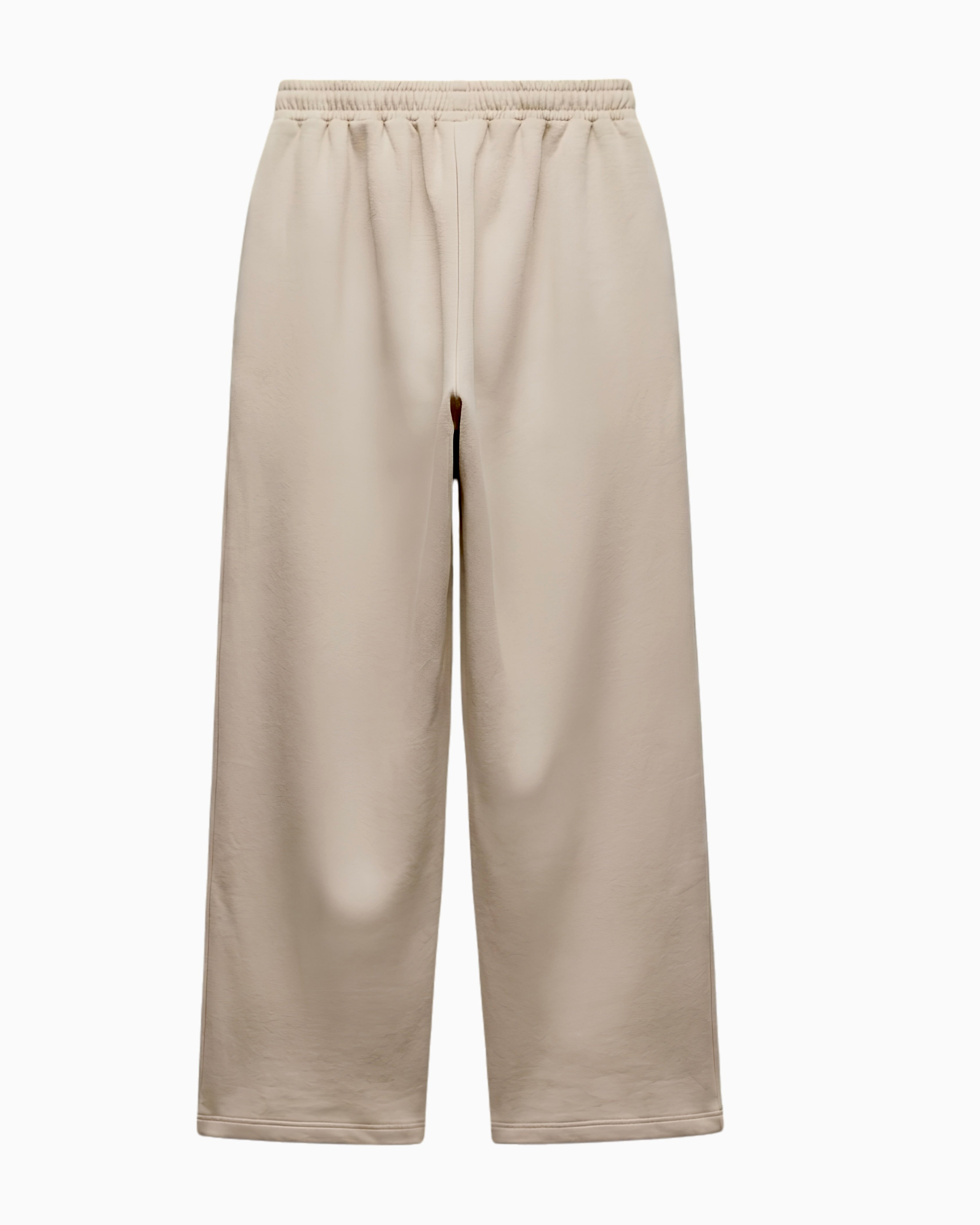 A pair of wide-leg cropped pants in a light beige or sand color, featuring an elastic waistband, shown against a plain white background.