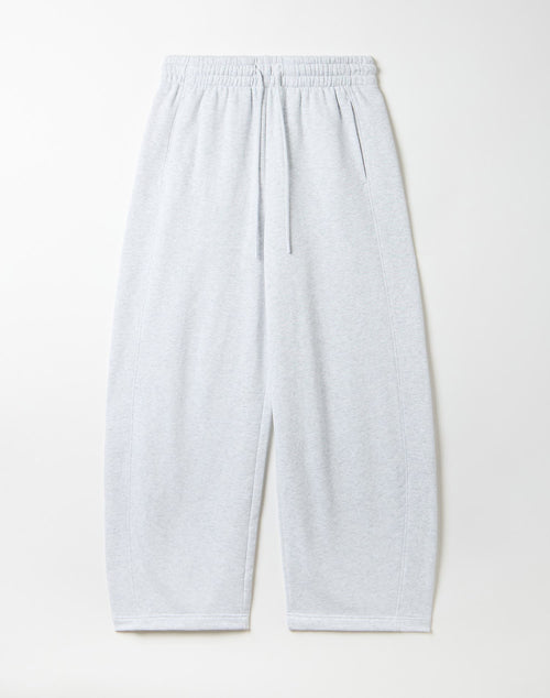 Light heather gray sweatpants with an elastic waistband and drawstring, laid flat against a light off-white background.